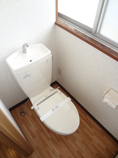 Toilet. It is with warm heating toilet seat even in the winter