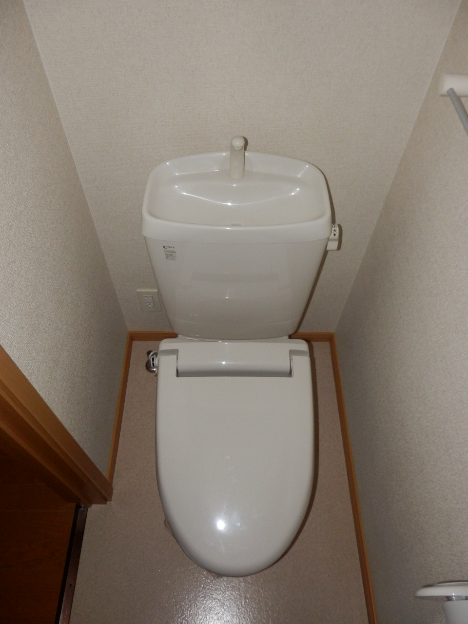 Toilet. A heated toilet seat