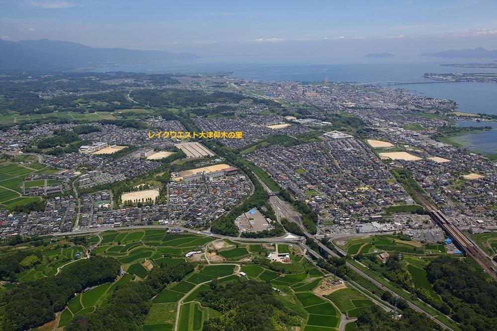 aerial photograph. primary school, Junior high school, Many of the green, park, Lake Biwa is visible.
