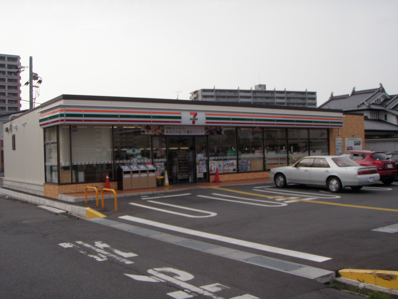 Convenience store. Seven-Eleven Yasu Tominami store up (convenience store) 105m