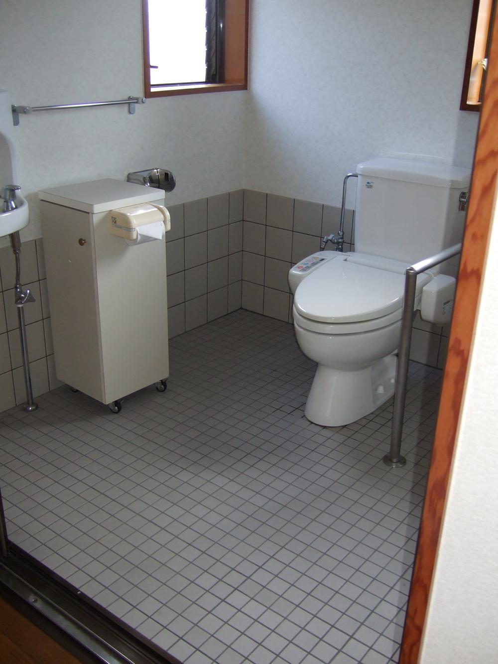 Toilet. Spacious barrier-free, Toilet with warm water washing toilet seat