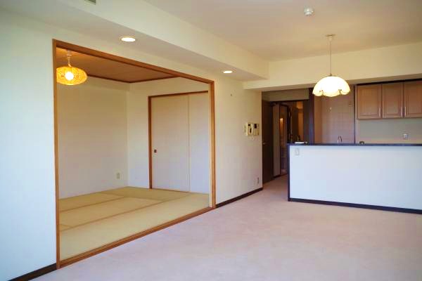 Living and room. Living room and kitchen as seen from the Japanese-style room