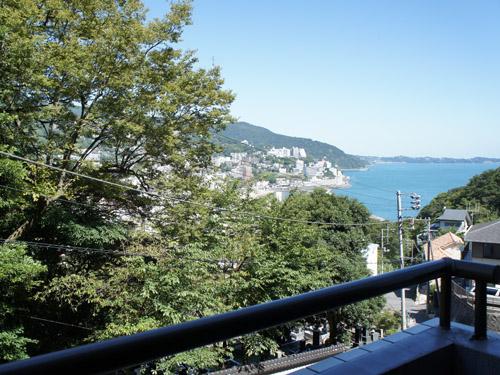 View photos from the dwelling unit. Overlooking the sea on the balcony right hand