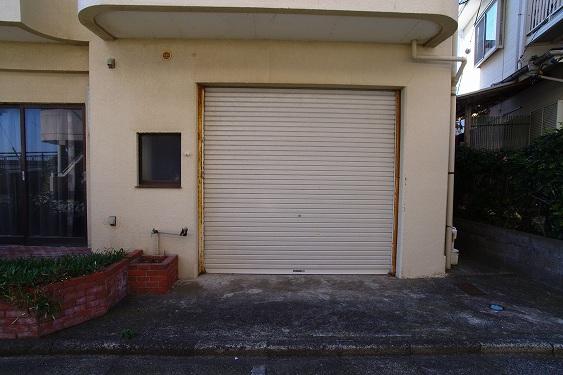 Parking lot. Shutter garage