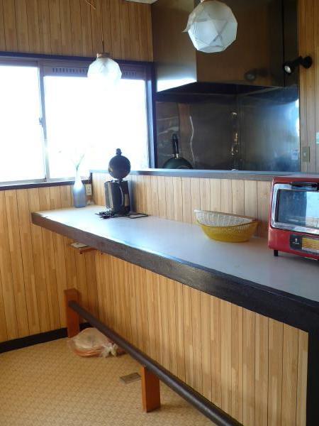 Kitchen. Dining is counter type. Because it was made for villa, It has not been provided with a solid table.