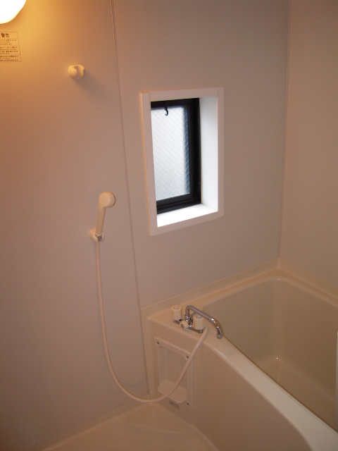 Bath. Bright bathroom because there is a window