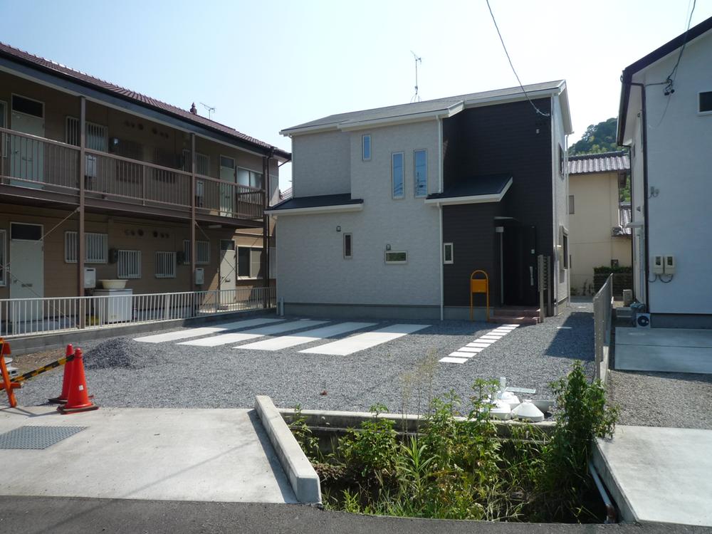 Local appearance photo. There is a car four or more put space