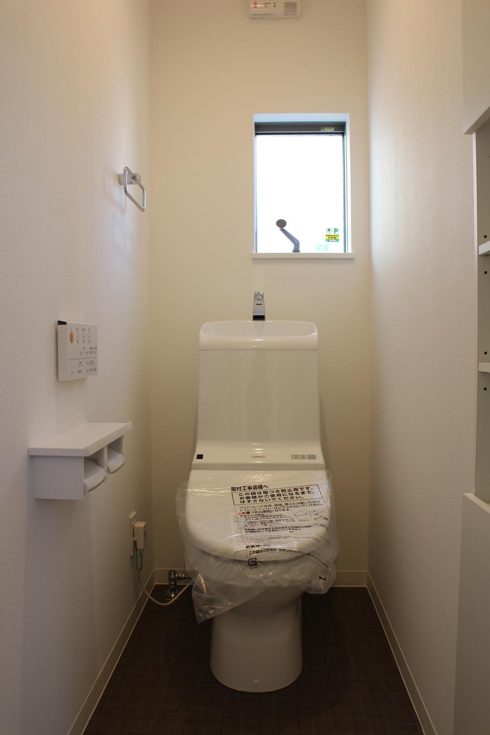 Toilet. First floor toilet with Washlet. . 