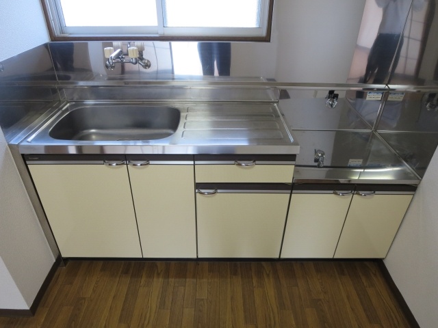 Kitchen. It is a photograph of the same type type.