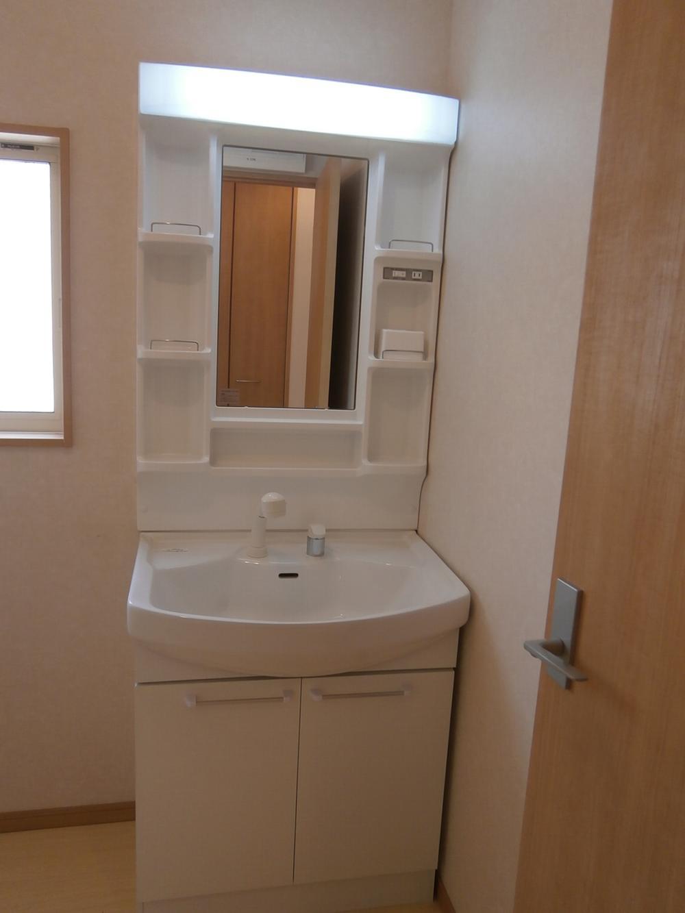 Wash basin, toilet. Vanity with shower (local 2013 September 2 shooting)