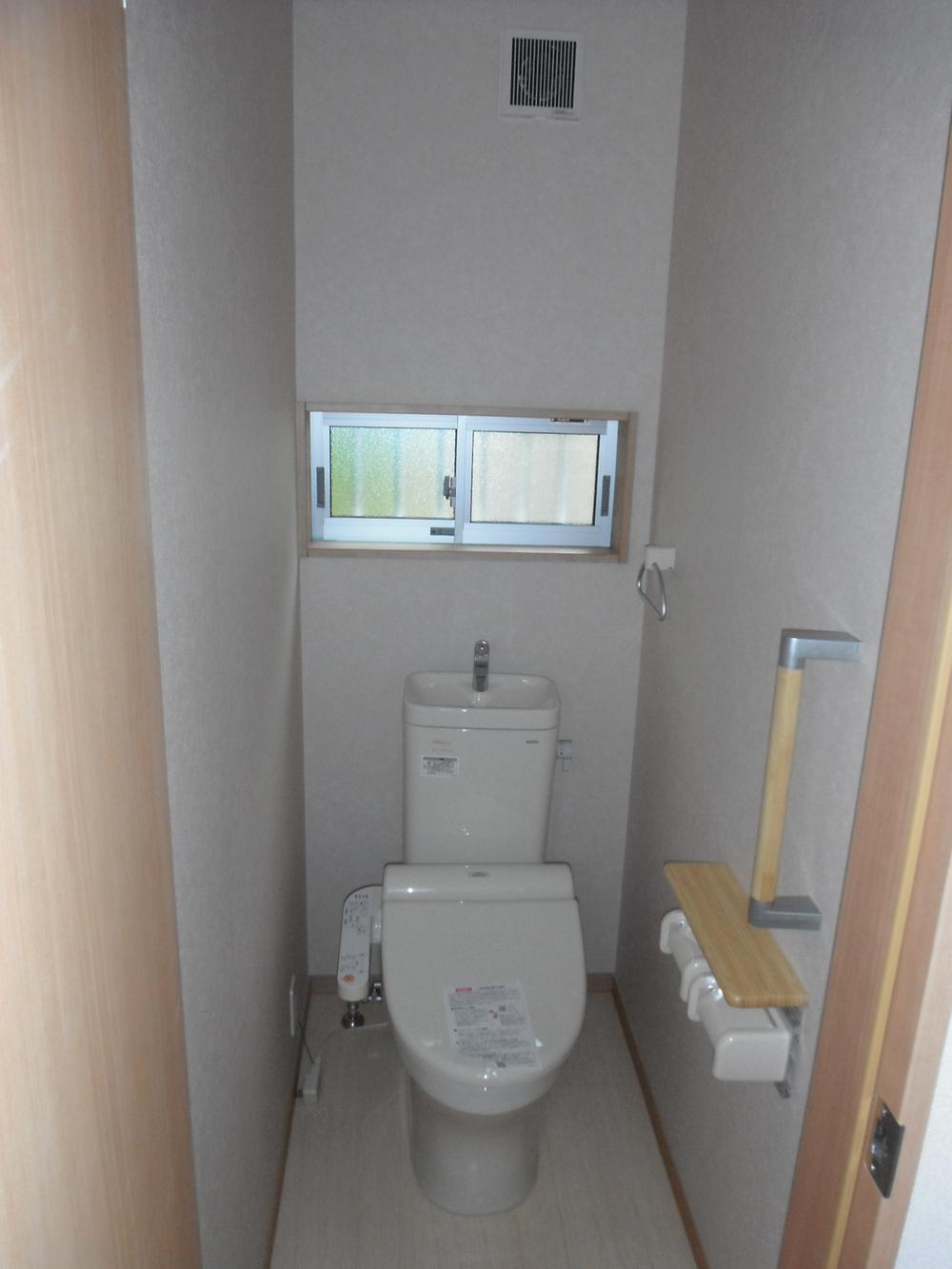 Toilet. The first floor is a toilet (with washlet). 