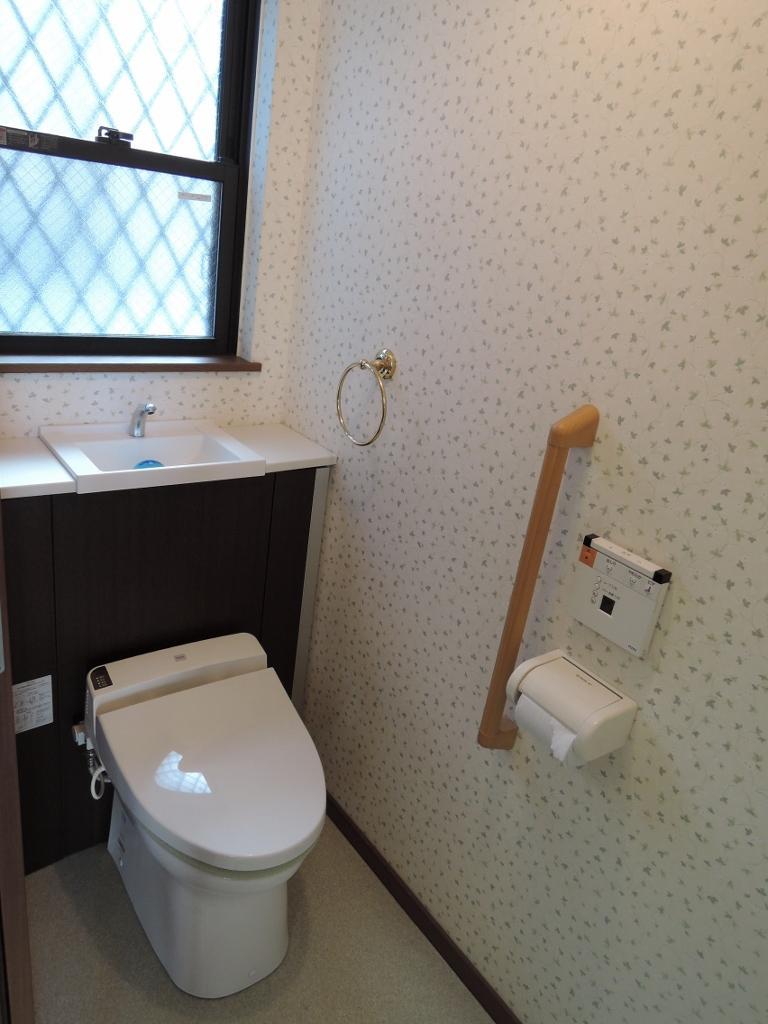 Toilet. Toilet of the sliding door, With handrail, Bidet. Friendly design also to our elderly.