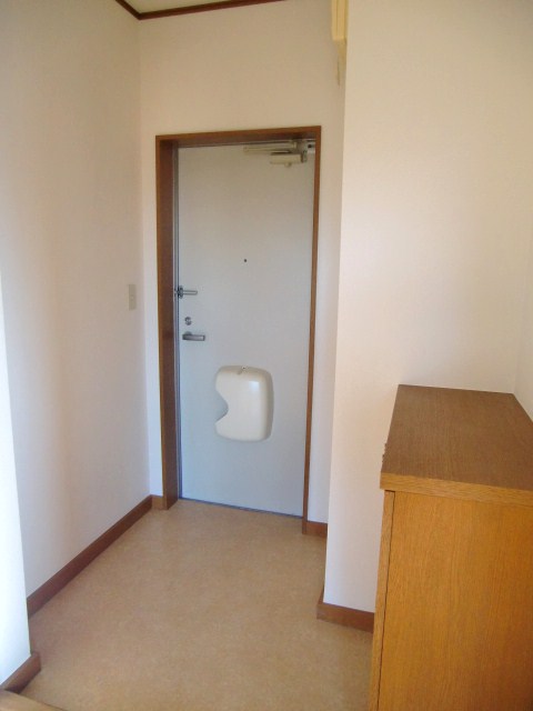 Entrance. With cupboard