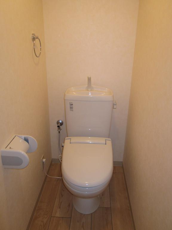 Toilet. A heated toilet seat