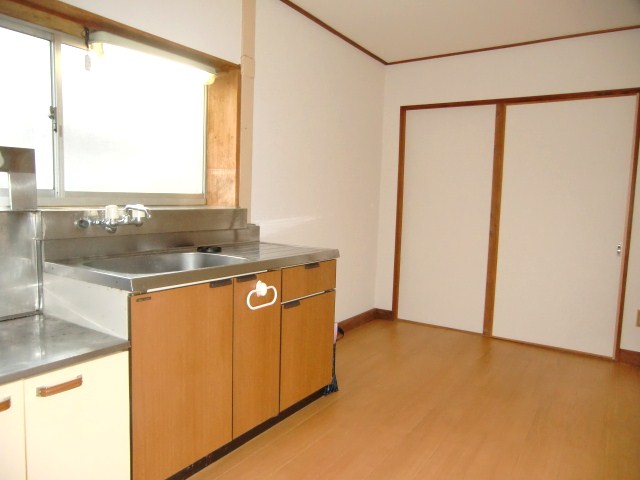 Kitchen. Window is attached to the kitchen