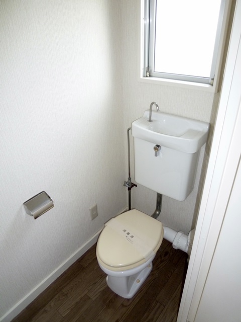 Toilet. Toilet with a small window