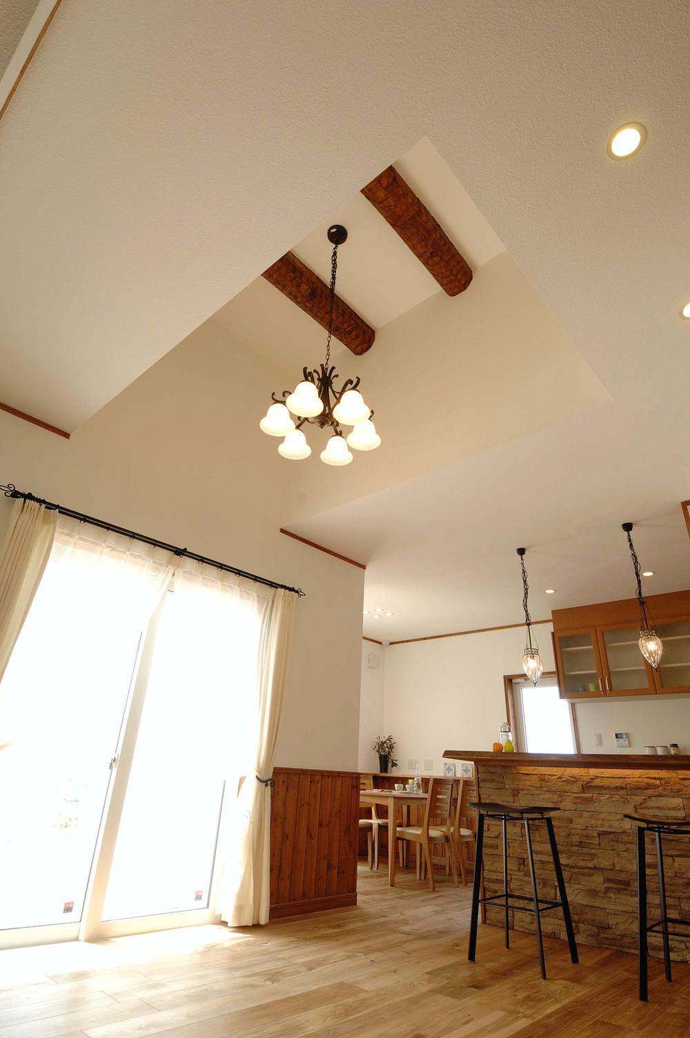 Living. Ceiling beams accent of living top. 
