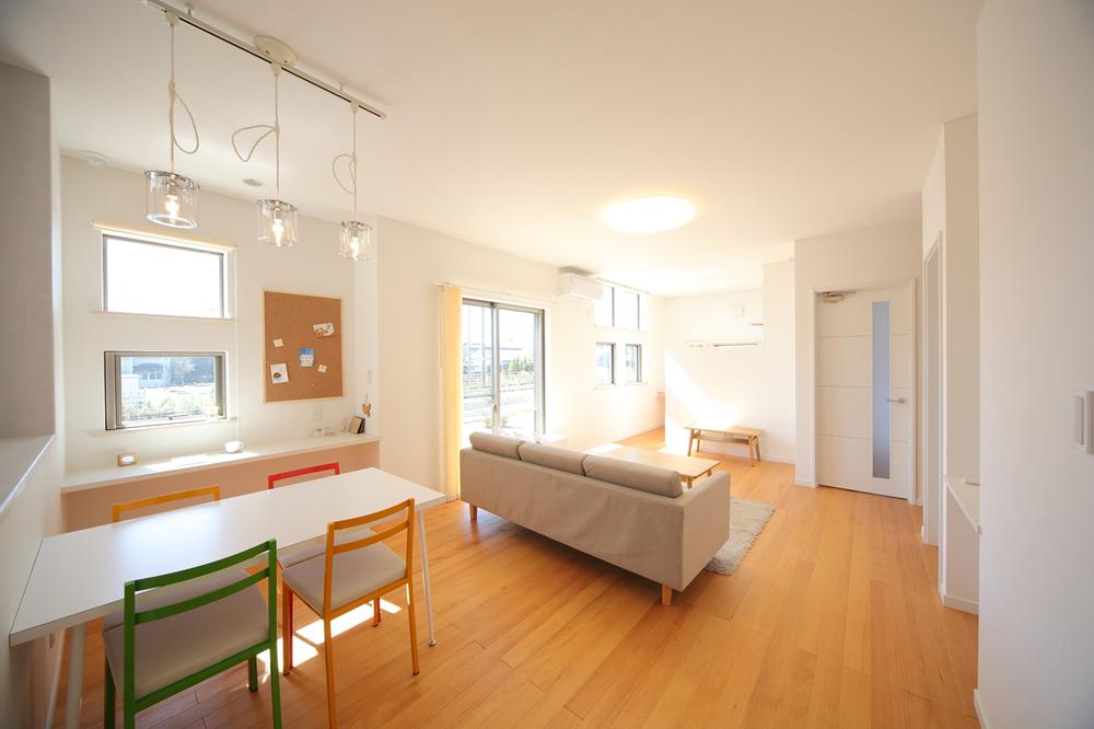 Living. A straight line of the spacious living room. 