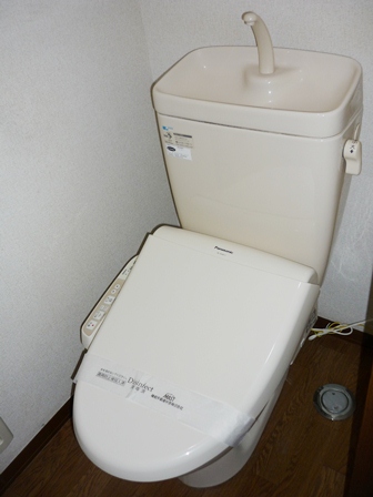 Toilet. It is a warm water washing toilet seat