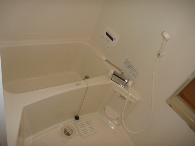 Bath. Automatic hot water beam and with additional heating function