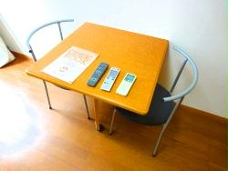 Living and room. Folding table and two chairs