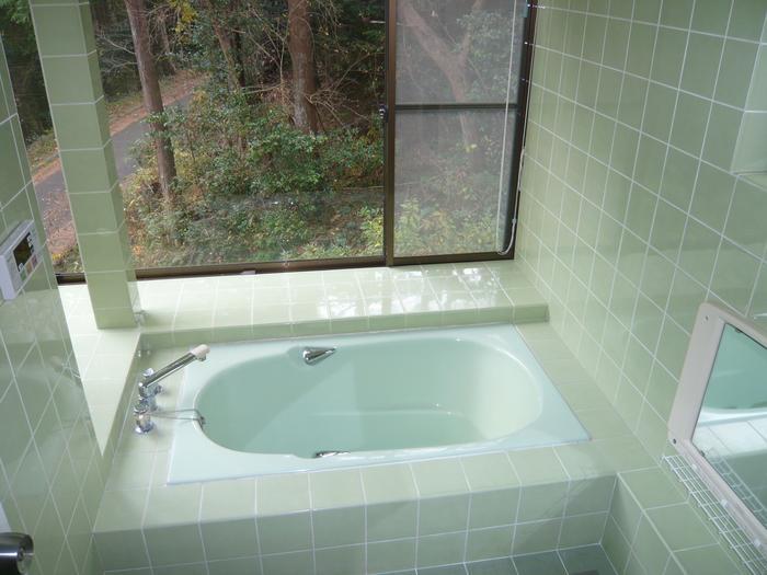 Bathroom. Bathroom with a large window.