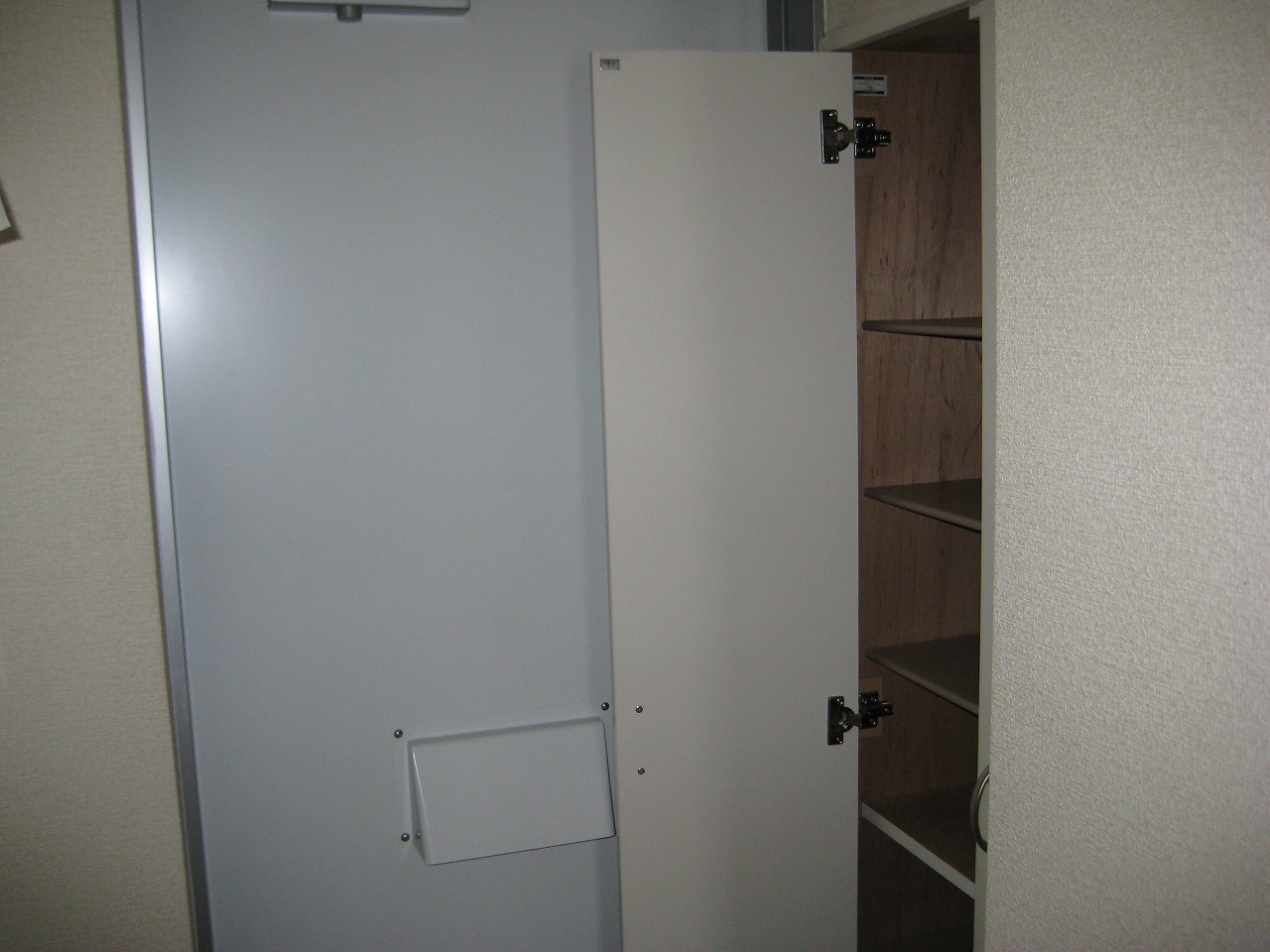 Entrance. Cupboard