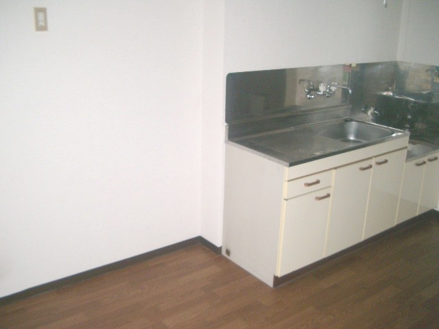 Kitchen. There is space put also other cupboard of the refrigerator