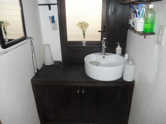 Wash basin, toilet. Stylish washroom
