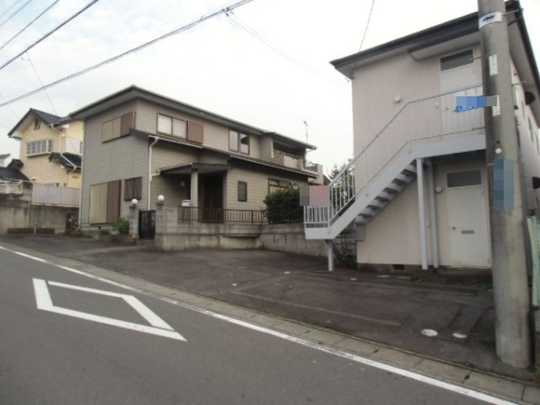 Local appearance photo. Building appearance Back residential part, The front is the apartment part.