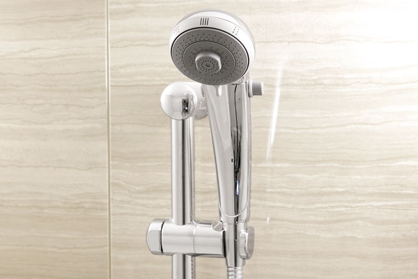Bathing-wash room.  [Fushiyugata Shower Faucets] Section hot water shower faucet with hand stop function has been adopted (same specifications)