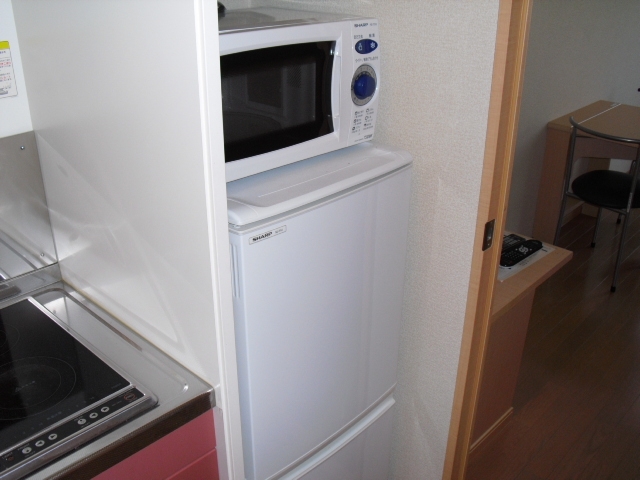 Other Equipment. Two-door refrigerator and range Equipped essentials! !