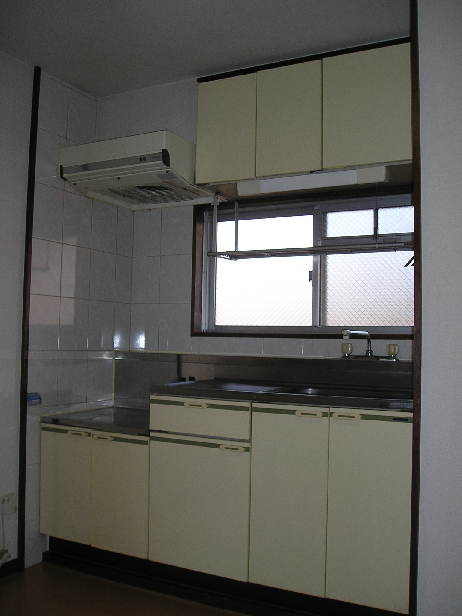 Kitchen. There is a window before the kitchen