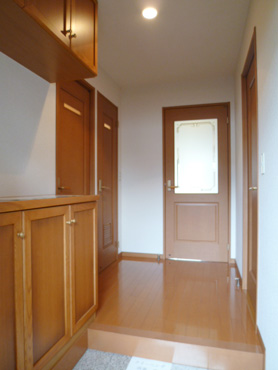 Entrance. Thank cupboard up and down. It is also a spacious entrance hall.