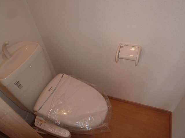 Toilet. It is a photograph of the same type