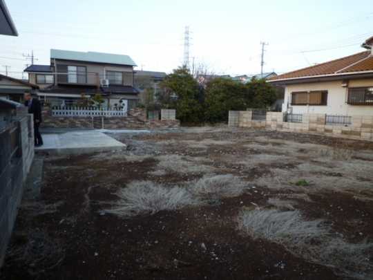 Local land photo. The hill is from the road.  Left of the concrete is a slab of parking.