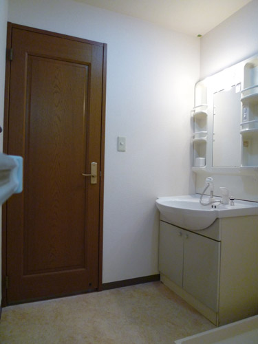 Washroom. It is indoor washing machine Storage.