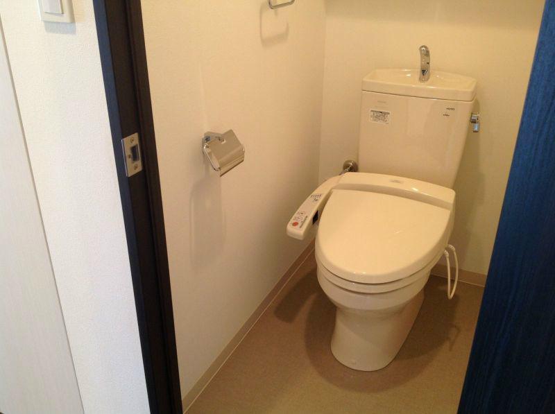 Toilet. It is the restroom. There are storage.