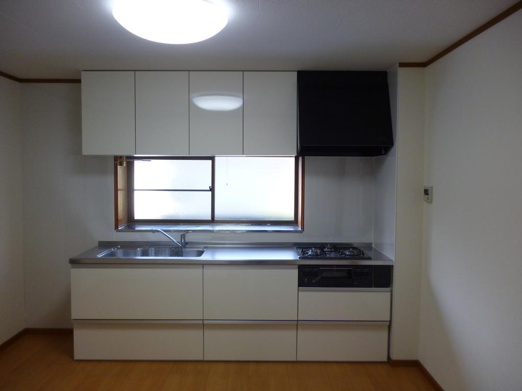 Kitchen. The kitchen is a clean kitchen spread.