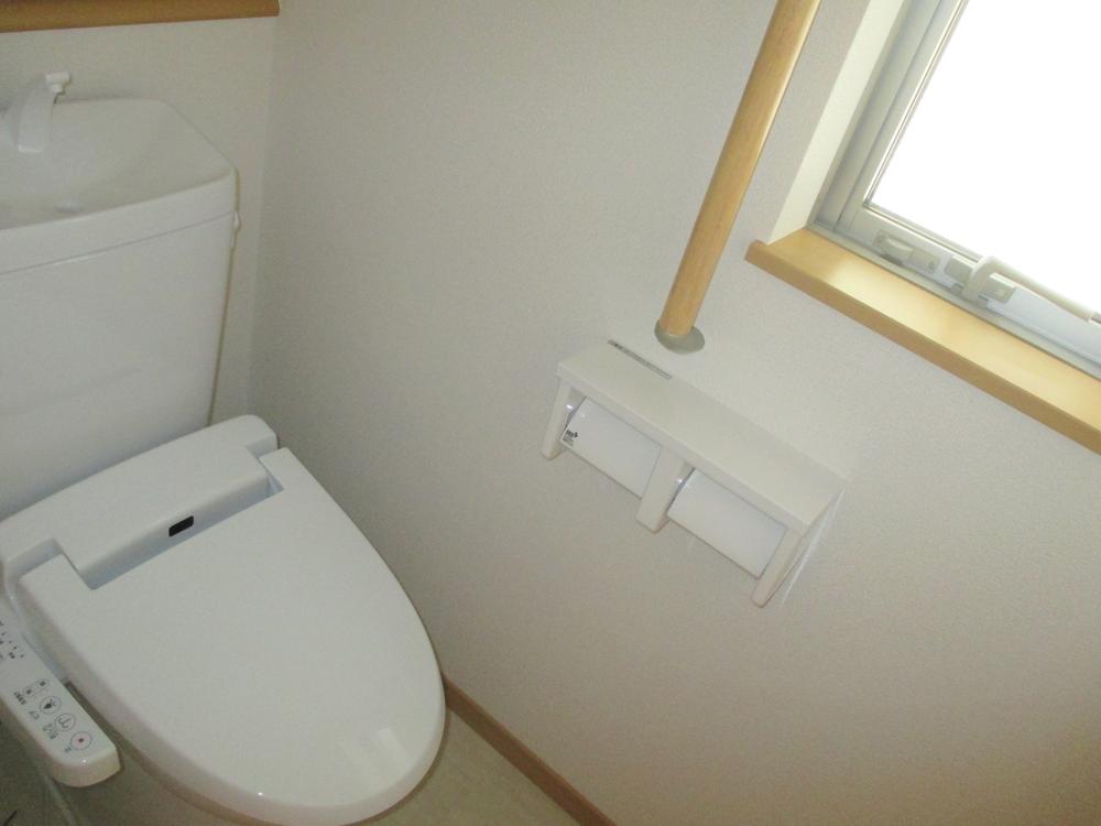 Toilet. Toilet with a handrail ☆