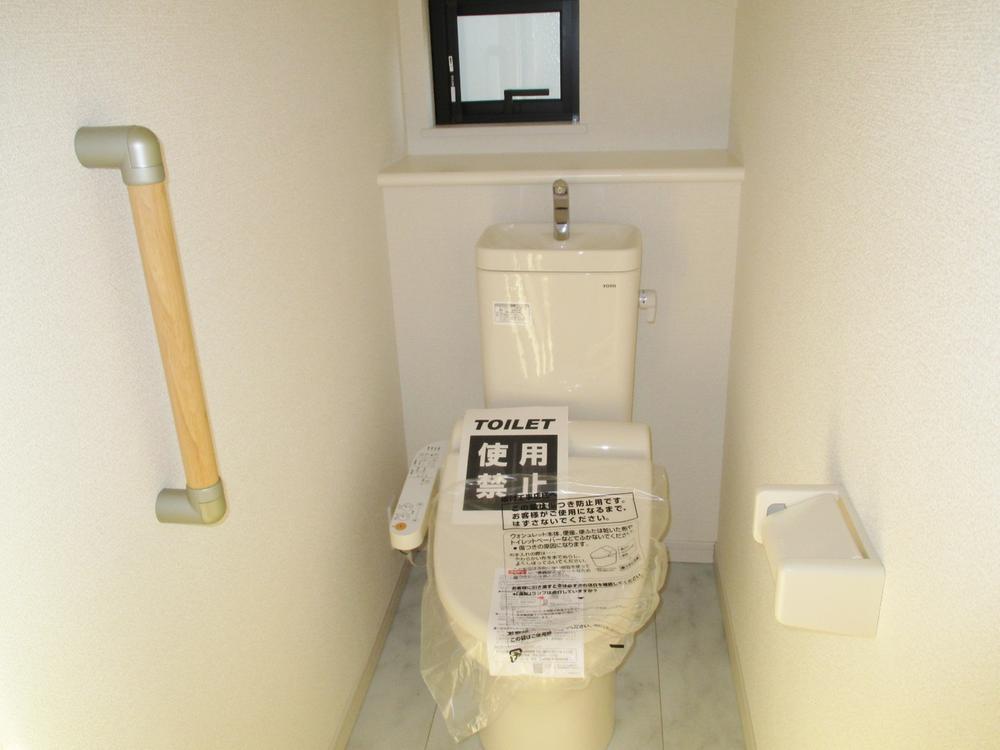 Toilet. Toilet with a handrail ☆