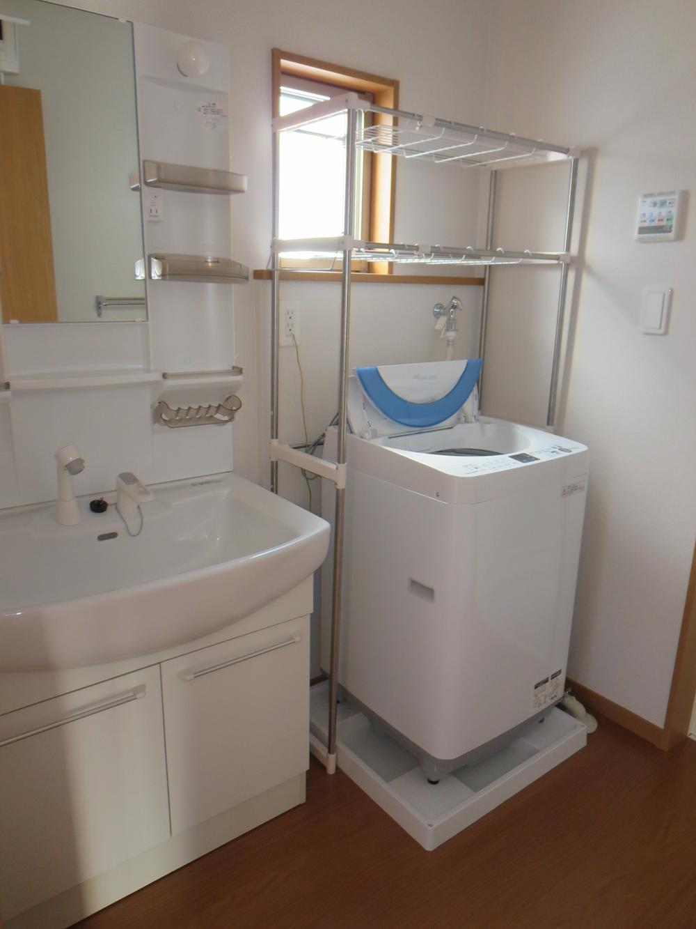 Wash basin, toilet. With washing machine