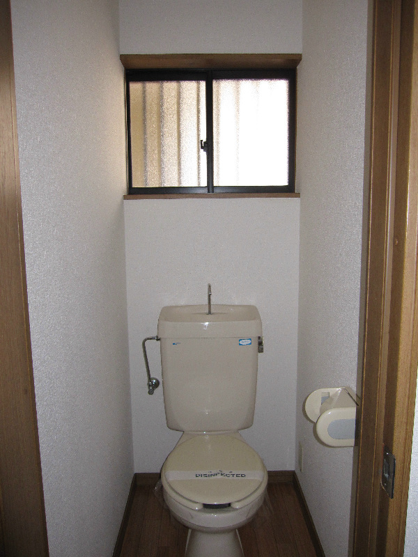 Toilet. There are window