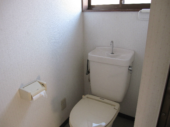 Toilet. There are window.