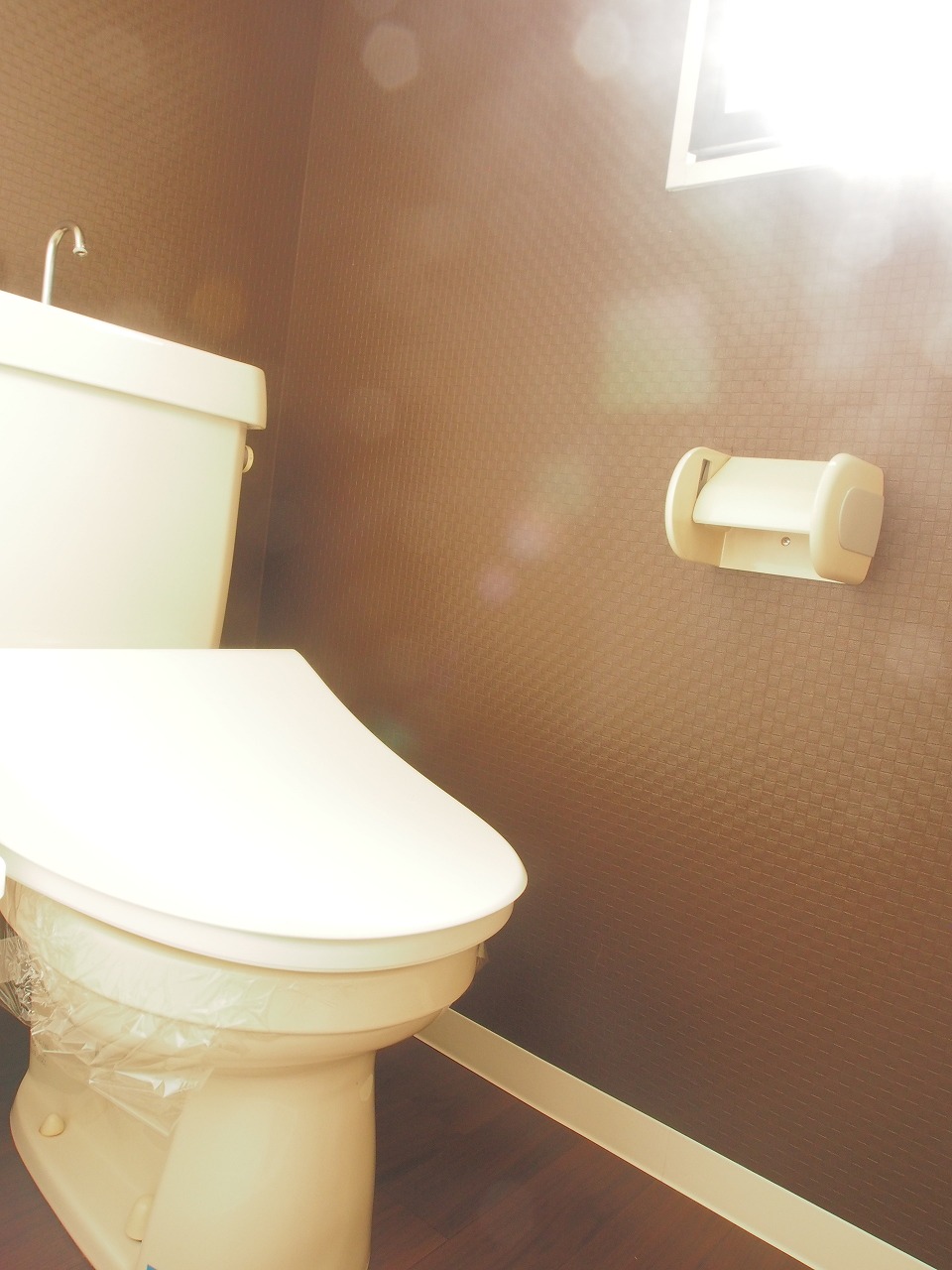 Toilet. Ventilation is also good bright because there is a small window in the toilet.