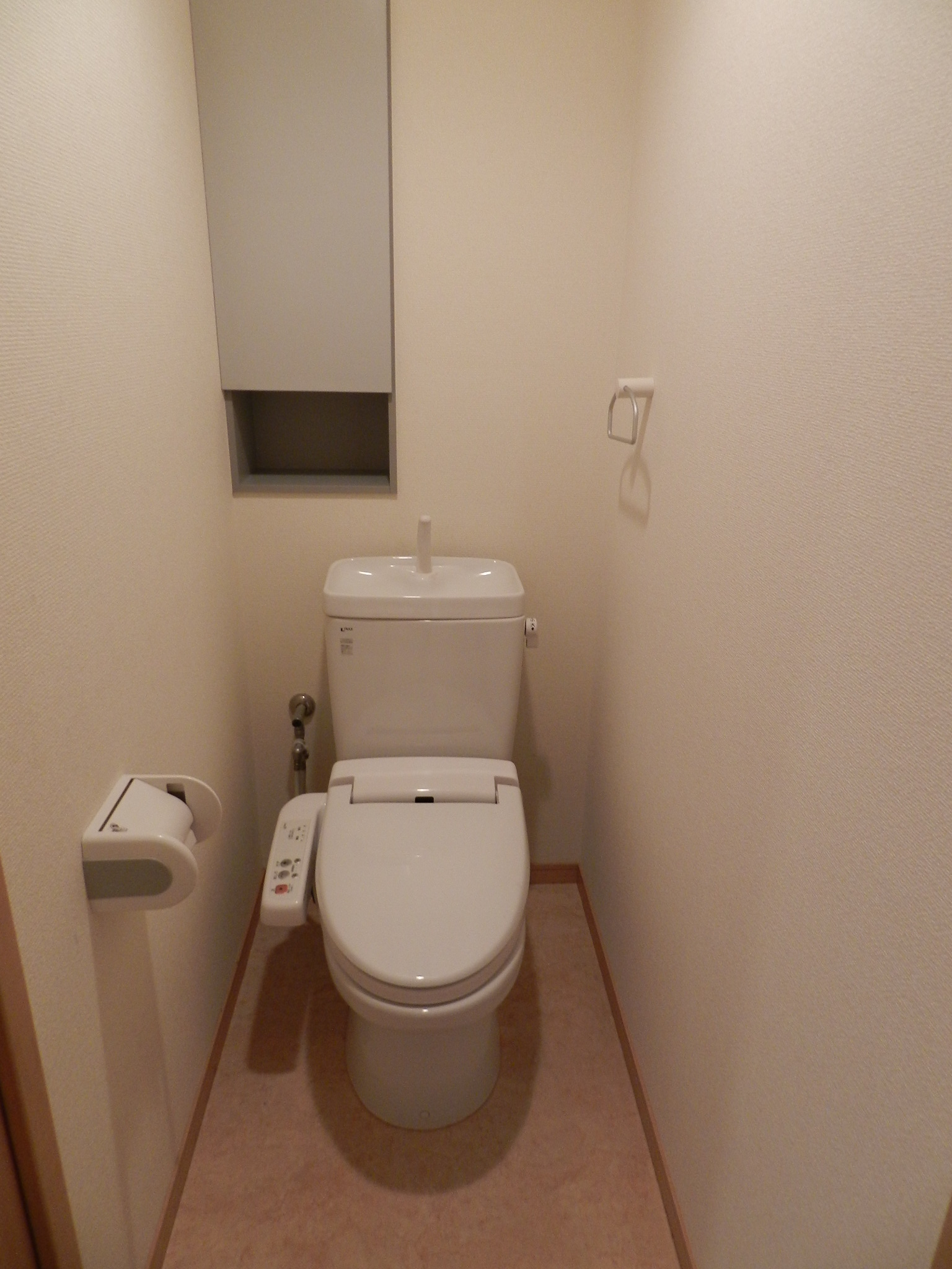 Toilet. Shower toilet With storage shelf
