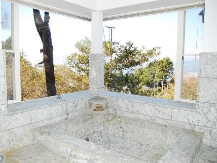 Bathroom. Bright bathroom with hot-spring bath with Izu stone