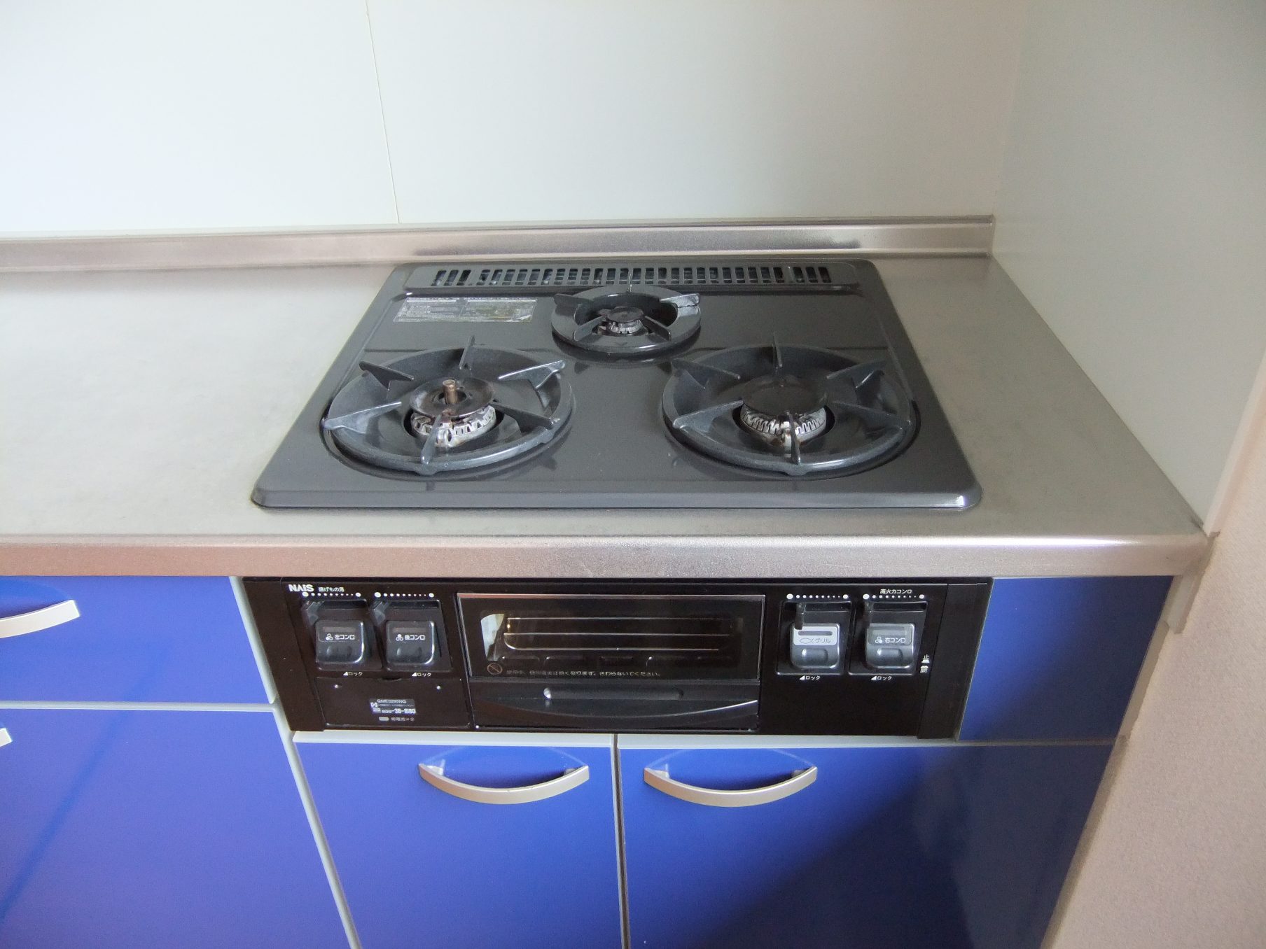 Kitchen. Stylish blue system kitchen.