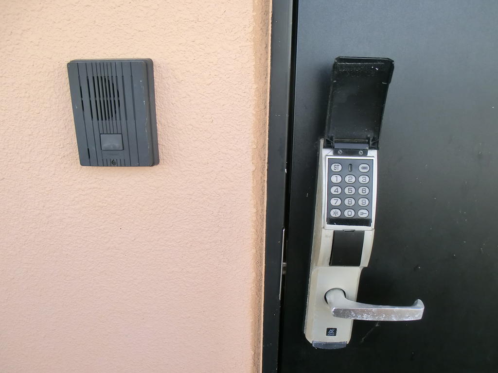 Entrance. PIN number is type digital lock.