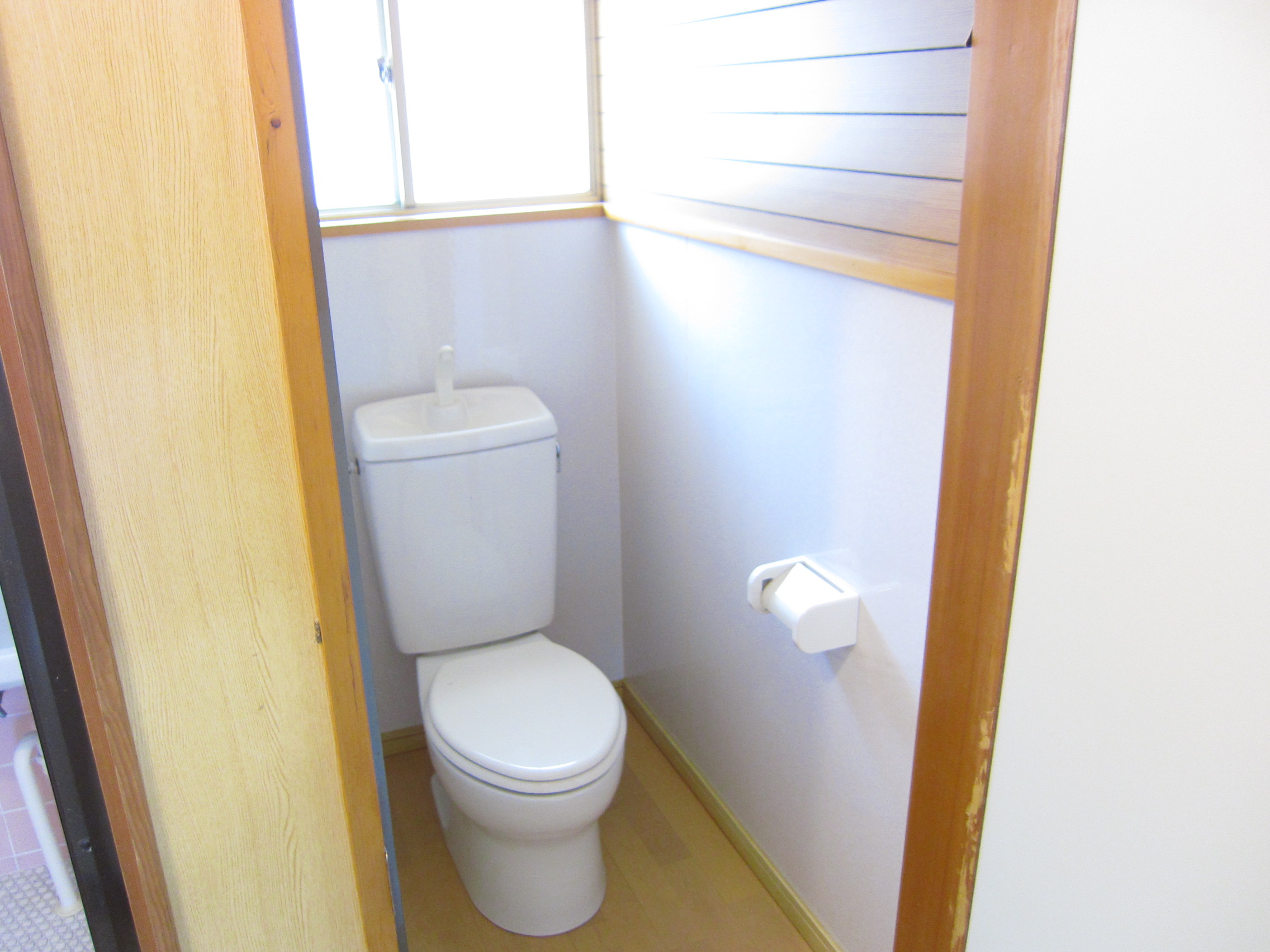 Toilet. It has secured sufficient space.